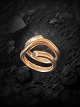 Georg Jensen 18 
karat (750) 
guld ring 
Magic. Designet 
af Regitze 
Overgaard. str 
51 
Regitze ...