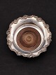 Silver plated 
wine coaster