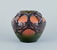 Ipsens, 
Denmark. 
Ceramic vase in 
Art Nouveau 
style.
Design 
depicting plant 
growth. Glaze 
in ...