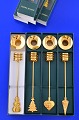 Georg Jensen 
Golden 
Christmas 4 
Adventskerzenhalter.
 
Kerzenhalter 
aus vergoldetem 
Messing. ...