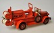 Tekno Falck 
Feuerwehrauto, 
Dänemark des 
20. 
Jahrhunderts. 
Begleiteter 
Fahrer. L.: 
18,5 cm. Mit 
...