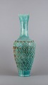 Gudmundur 
Einarsson 
(1895-1963), 
Icelandic 
ceramist. 
Ceramic floor 
vase featuring 
geometric ...