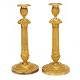 Paar 
feuervergoldete 
Empire 
Bronzenleuchter
Frankriech um 
1820
H: 34cm