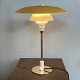 Poul Henningsen 
PH 4/2.75 table 
lamp with cast 
shade holder. 
Upper shade of 
original ...