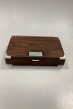 Hans Hansen 
Sterling Silver 
and wood Box. 
Measures 
22,4cm x 14,5cm 
x 4,7cm ( 8.82 
inch x 5.71 ...