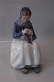 Royal 
Copenhagen 1317 
RC Amager Woman 
knitting  8.75” 
(Amager kvinde) 
 In mint and 
nice ...