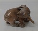 Royal 
Copenhagen Dog 
1407 RC 
Dachshund puppy 
chasing its 
tail  OM 7 x 11 
cm In mint and 
nice ...