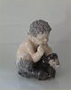 Royal 
Copenhagen 1712 
RC Faun with 
snake Chr. 
Thomsen 12 cm 
(1946)   In 
mint and nice 
condition