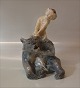 Royal 
Copenhagen  
1804 RC Faun 
pulling bear's 
ear KK  (1946) 
1. In mint and 
nice condition