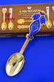 Anton Michelsen 
Weihnachtsbesteck, 
vergoldtem 
Sterling-Silber 
mit einem 
Emailmotiv. ...