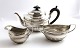 Englisches 
Teeservice aus 
Sterlingsilber 
(925). 
Bestehend aus 
Teekanne, 
Milchkännchen 
und ...