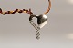 Heart in 14 
carat white 
gold, with 
diamonds in 
pendant. ...