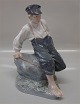 1 pcs 2nd
1 pcs 1st DKK 
1500
Royal 
Copenhagen 1659 
RC Boy on rock 
Chr. T. 1914 30 
cm
 In mint ...