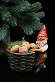 Old painted 
terracotta elf 
with a wicker 
basket for 
nuts, Christmas 
sweets or for a 
block ...