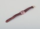 Longines men's 
wristwatch. 10 
karat gold 
filled.
Art Deco.
Approx. 1939.
Strap made of 
lizard ...