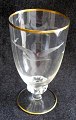 Måge (Möve)Glas 
Service. 
Klarglas mit 
Schliffen und 
Goldrand auf 
Fuß und Rand. 
Lyngby Glas.
Pt: ...