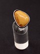 Sterling silver 
ring with amber