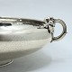 Georg Jensen 
silver 
centerpiece.
Round 
centerpiece of 
lightly 
hammered 
sterling 
silver, adorned 
...