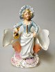 Deutsche 
Porzellanfigur, 
kaltbemalt, 
Bisquit, ca. Um 
1900. Frau hält 
eine Flasche. 
H.: 16 ...