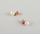 Swedish 
goldsmith. A 
pair of classic 
ear studs in 18 
...
