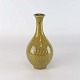 Vase i stentøj 
med gulgrøn 
glasur
Formgiver 
Gunnar Nylund
Producent 
Boveskov ...