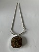 Silver necklace 
with gneiss 
stone pendant
The necklace 
...