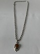 Silver necklace 
with Amber 
pendant
The necklace 
44.5 cm ...