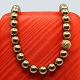 Ole Lynggaard; 
Clasp in 14k 
gold with 
flowers