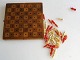 Transportable 
chess set, 
approx. 1900. 
With pieces in 
legs - white 
and red. Box in 
fruit wood. ...