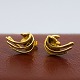 Anette Kræn; A 
pair of 
earrings made 
in 14k gold. 
1,5 cm x 1 cm. 
Anette Kræn b. 
1945, d. ...