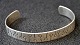 Schwedisches 
Armband aus 
Silber, 20. 
Jahrhundert. 
Gestempelt: HK 
916H H7. 
Graviert. 
Durchmesser: 
...