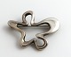 Georg Jensen. 
Sterling-
Brosche 
„Splash“. 
Henning Koppel. 
Modell 321. 
Länge 4,5 cm