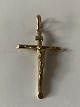 Cross with 
Christ pendant 
in 14 carats
Gold stamp: 
...