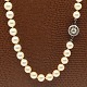 Hugo Grün; A 
pearl necklace 
with 14k white 
gold clasp, ...