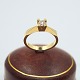 Henning 
Ulrichsen; Ring 
in 14k gold, 
set with a 
diamond, 0.20 
ct. W SI.
Ring size 50.
Stamped ...