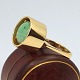 Flemming Lund; 
A 14k gold ring 
set with jade