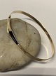 Bracelet in 14 
carat gold with 
white/black 
stone