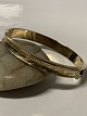 14 carat bangle 
with chisels.