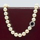 Hartmann's; A 
pearl necklace 
with 18k white 
gold clasp, ...