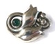 Georg Jensen. 
Brosche aus 
Sterlingsilber 
mit Mondstein. 
Modell 100C. 
Breite 45 mm.