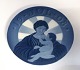 Royal 
Copenhagen. 
Weihnachtsplatte 
1908. Maria mit 
dem Kind. 
Durchmesser 
15,5 cm. (1 
Wahl)
