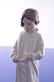 Royal 
Copenhagen  
Porzellanfigur. 
Mädchen im 
nachtkleid 
"Guten Morgen" 
Nr. 1624. Höhe 
20 cm. ...