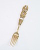 Christmas fork 
with mistletoe 
motif made of 
gold-plated 
sterling 
silver. 
Designed by Ole 
Hagen ...