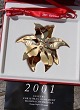 Weihnachtsmobile 
2001 
Weihnachtsstern 
aus vergoldet 
Messing von 
Georg Jensen, 
Dänemark. 
Georg ...