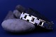 Block gold 
bracelet with 3 
rows, 14 carat 
gold. Length: 
...
