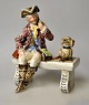 Deutsche 
Fayencefigur, 
19. Jahrhundert 
Jäger auf einer 
Bank mit Hund. 
Nummer: I 735. 
Polychrome ...