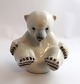 Königliches 
Kopenhagen. 
Porzellanfigur. 
Sitzendes 
Eisbärjunges. 
Modell 536. 
Höhe 13 cm. (1 
Wahl)