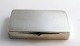 Silberdose 
(900). Länge 
9,5 cm. Breite 
6 cm. Höhe 1,6 
...