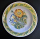 Kelinghusen 
tiefer 
Fayence-Teller, 
19. 
Jahrhundert. 
Polychrom 
dekoriert mit 
Blumenstrauß. 
...