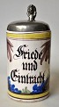 Bierkrug, 
Fayence, 
Hannoversch 
Münden, ca. 
1830, 
Deutschland. 
Polychromer 
Dekor mit 
deutschem ...